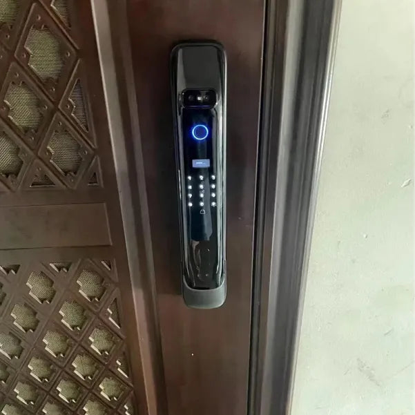 Face recognition smart door lock with camera, display and lit fingerprint ring, fitted to a carved timber door