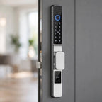 Silver short-handle smart door lock fitted to a grey entry door